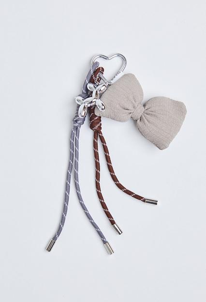 Sui Ava Puffy Bow Bag Charm Beige
